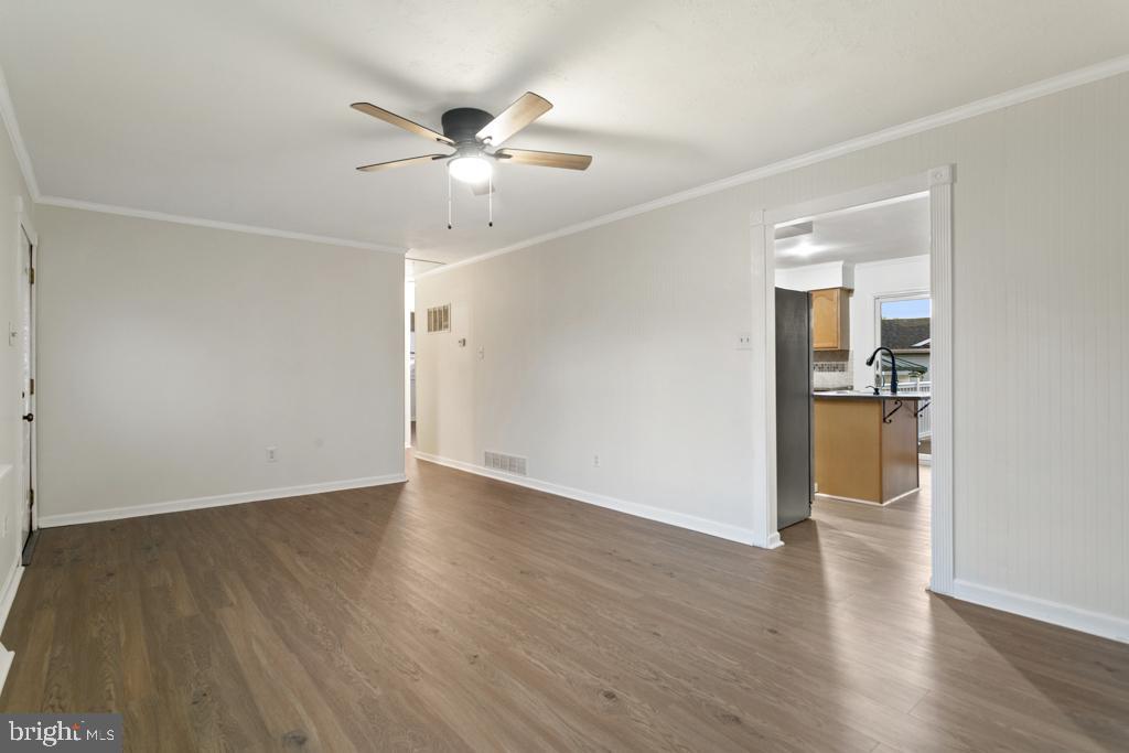 9 Oberlin Road Pennsville, NJ 08070 - Photo 9 of 23 a view of an empty room with wooden floor