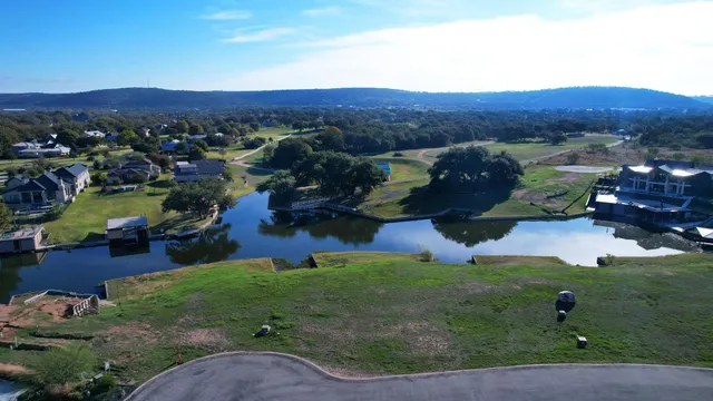 a view of a garden and mountains