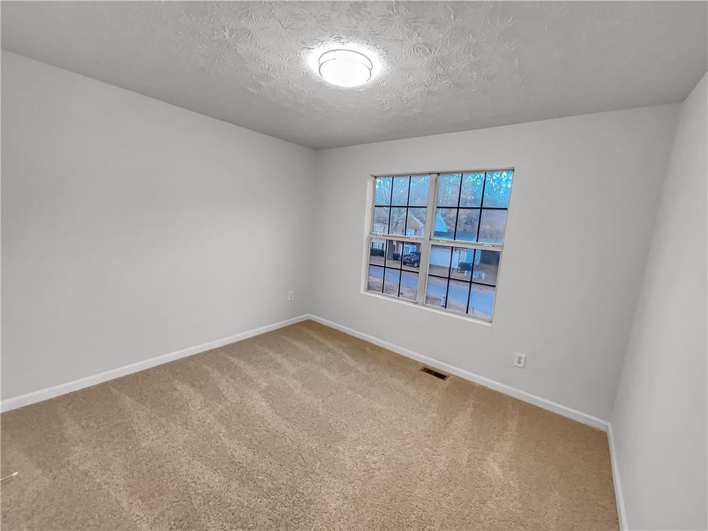 3624 Summit Pines Decatur, GA 30034 - Photo 12 of 21 a view of an empty room with a window