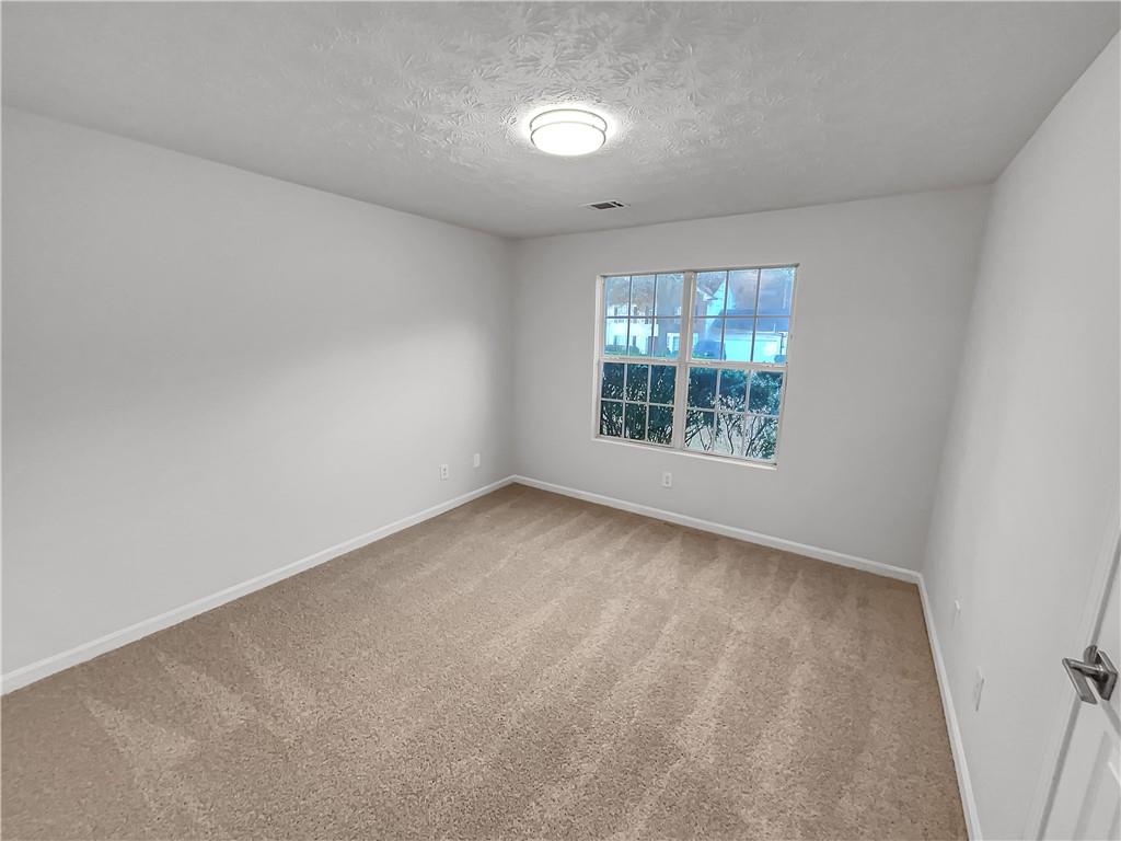 3624 Summit Pines Decatur, GA 30034 - Photo 15 of 21 an empty room with a window