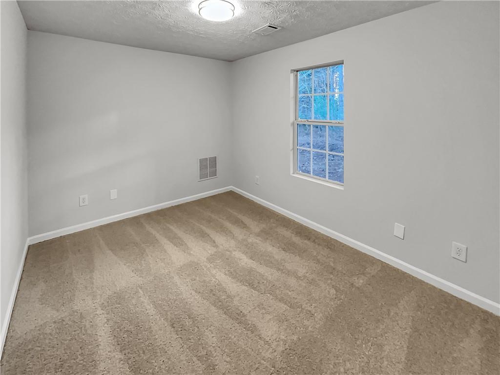 3624 Summit Pines Decatur, GA 30034 - Photo 18 of 21 an empty room with a window