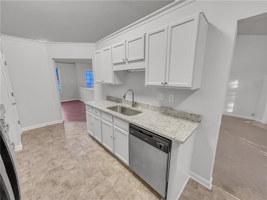 3624 Summit Pines Decatur, GA 30034 - Photo 8 of 21 a kitchen with stainless steel appliances granite countertop a sink stove and cabinets