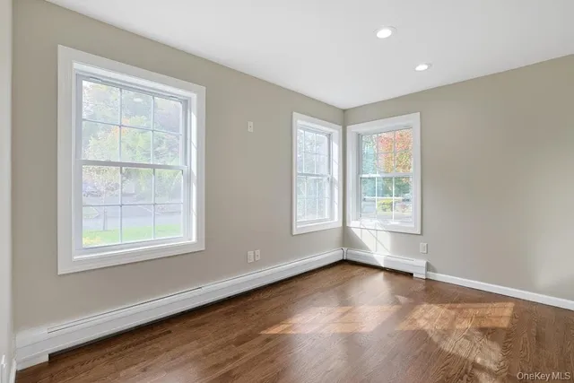 a bathroom with a sink mirror toilet and shower
