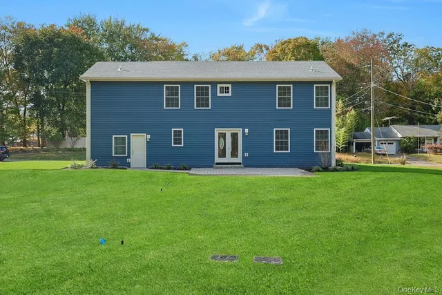 a view of a park with large trees