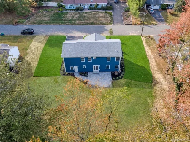 a aerial view of a house with garden