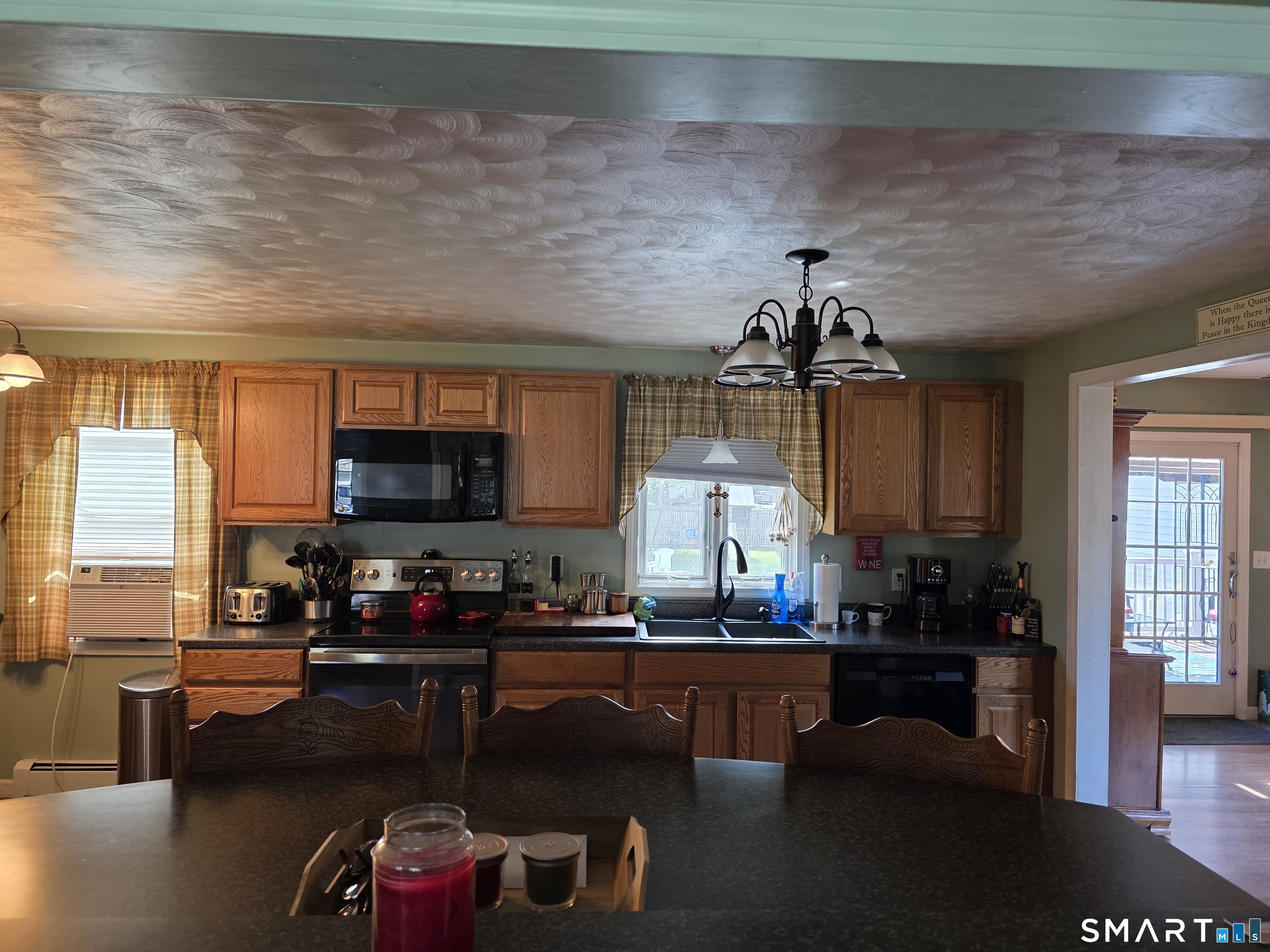 15 Van Buren Road Enfield, CT 06082 - Photo 17 of 40 a kitchen with sink refrigerator and cabinets