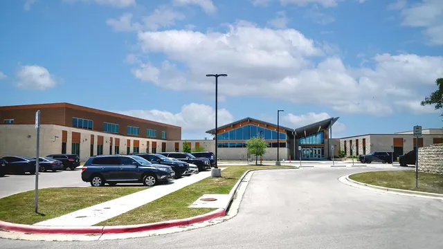 a view of a building with tree s