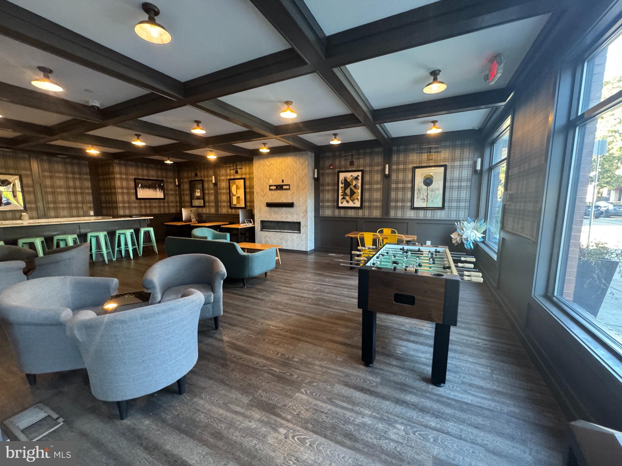 6610 Germantown Avenue, Unit LL6 Philadelphia, PA 19119 - Photo 2 of 38 a living room with furniture and a table