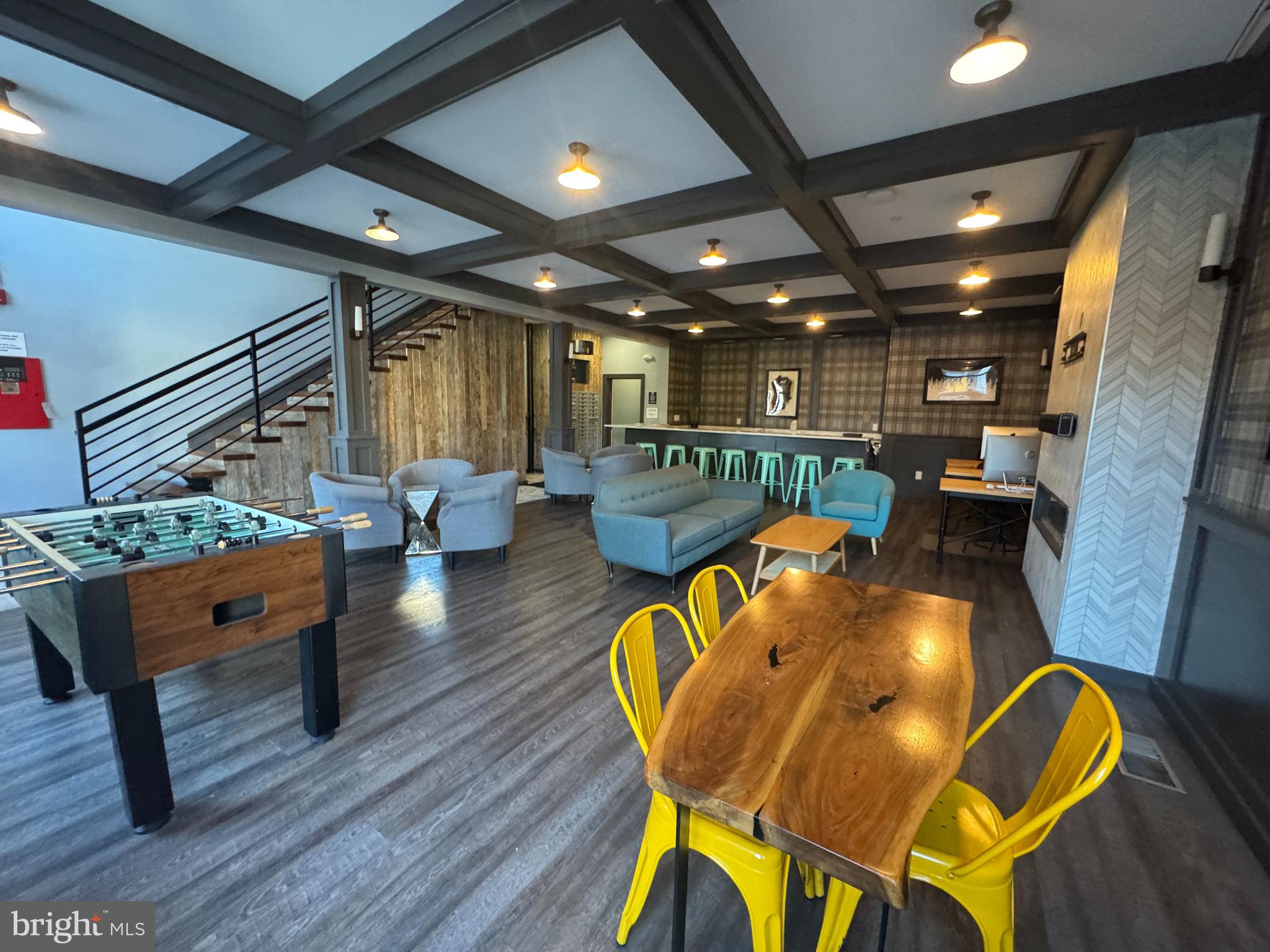 6610 Germantown Avenue, Unit LL6 Philadelphia, PA 19119 - Photo 3 of 38 a dining room with furniture and a chandelier