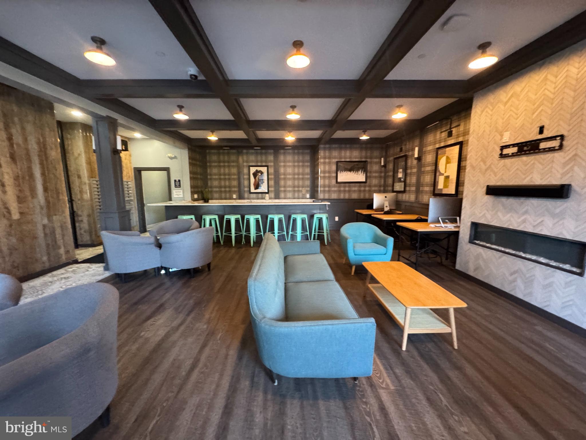 6610 Germantown Avenue, Unit LL6 Philadelphia, PA 19119 - Photo 4 of 38 a living room with furniture and a wooden floor