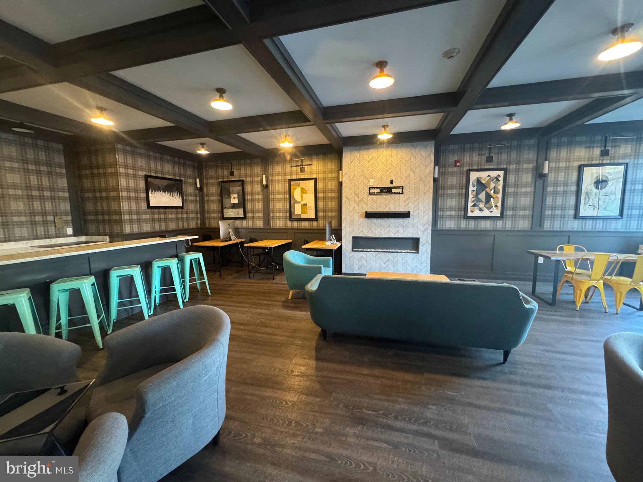 6610 Germantown Avenue, Unit LL6 Philadelphia, PA 19119 - Photo 5 of 38 a living room with furniture and wooden floors