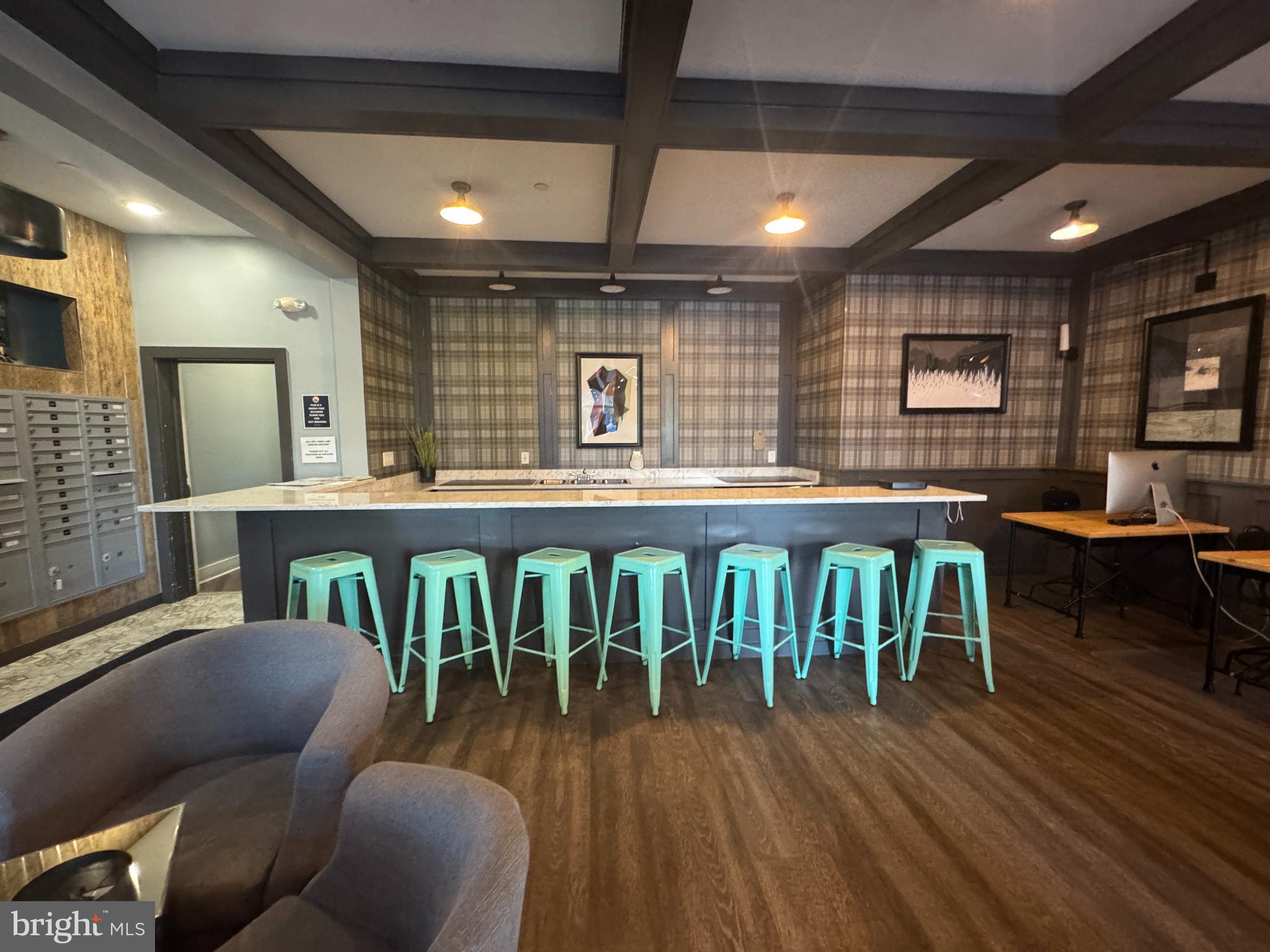 6610 Germantown Avenue, Unit LL6 Philadelphia, PA 19119 - Photo 6 of 38 a dining room with furniture and wooden floor