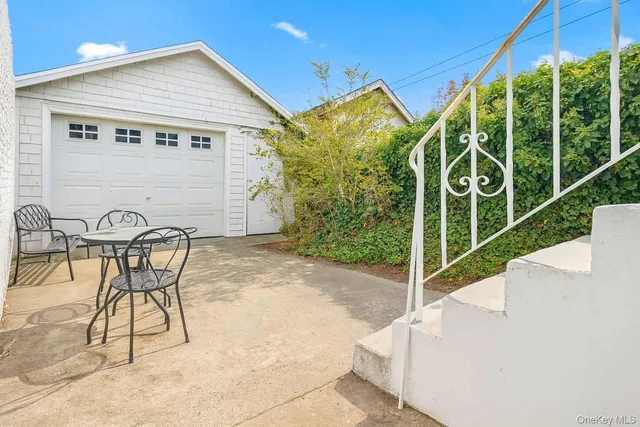 a view of an chairs and tables in the patio