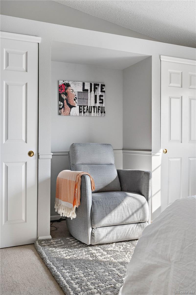 5155 West 68th Avenue, Unit 5 Westminster, CO 80030 - Photo 16 of 33 a living room with a couch
