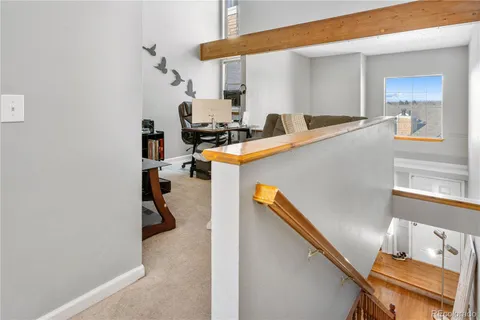 a kitchen with a refrigerator and a stove