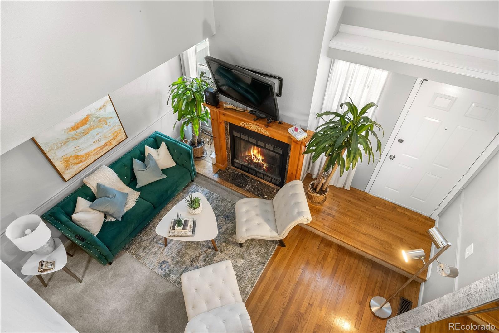 5155 West 68th Avenue, Unit 5 Westminster, CO 80030 - Photo 20 of 33 view of living room with furniture and a potted plant