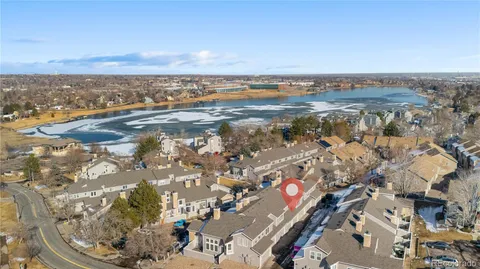 an aerial view of residential building and ocean