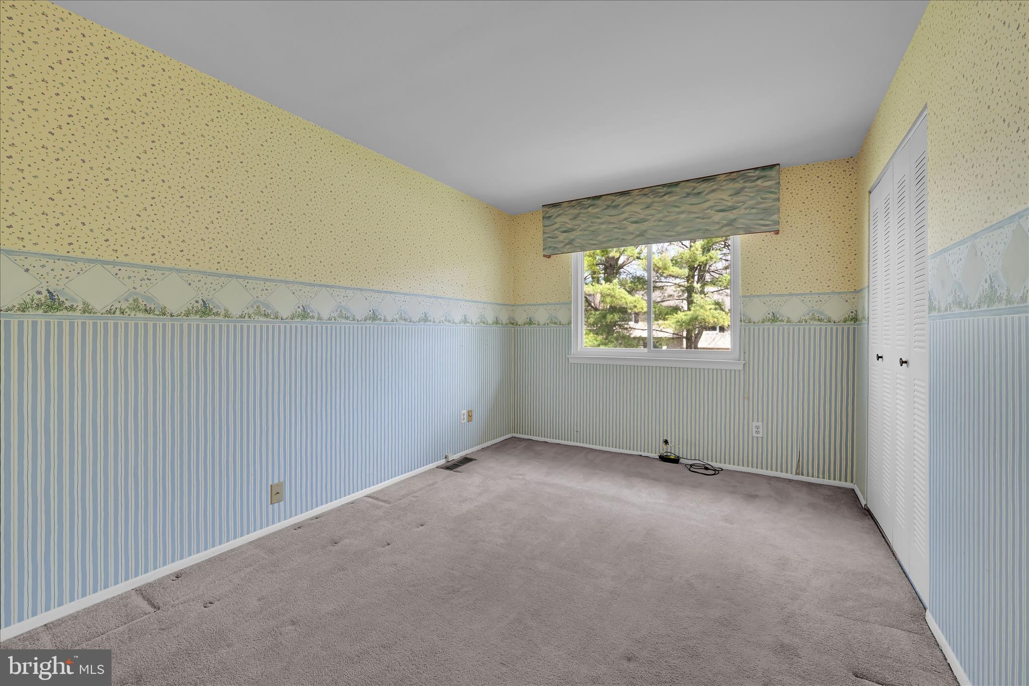 402 Village Walk, Unit 402 Exton, PA 19341 - Photo 17 of 27 an empty room with windows