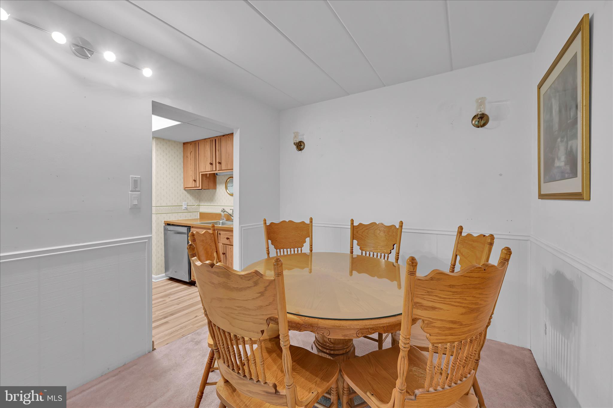 402 Village Walk, Unit 402 Exton, PA 19341 - Photo 8 of 27 a dining room with furniture and wooden floor