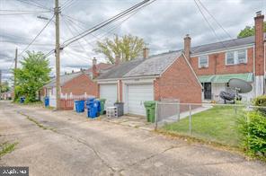 1618 Roundhill Road Baltimore, MD 21218 - Photo 40 of 50 a view of a house with a yard and sitting area