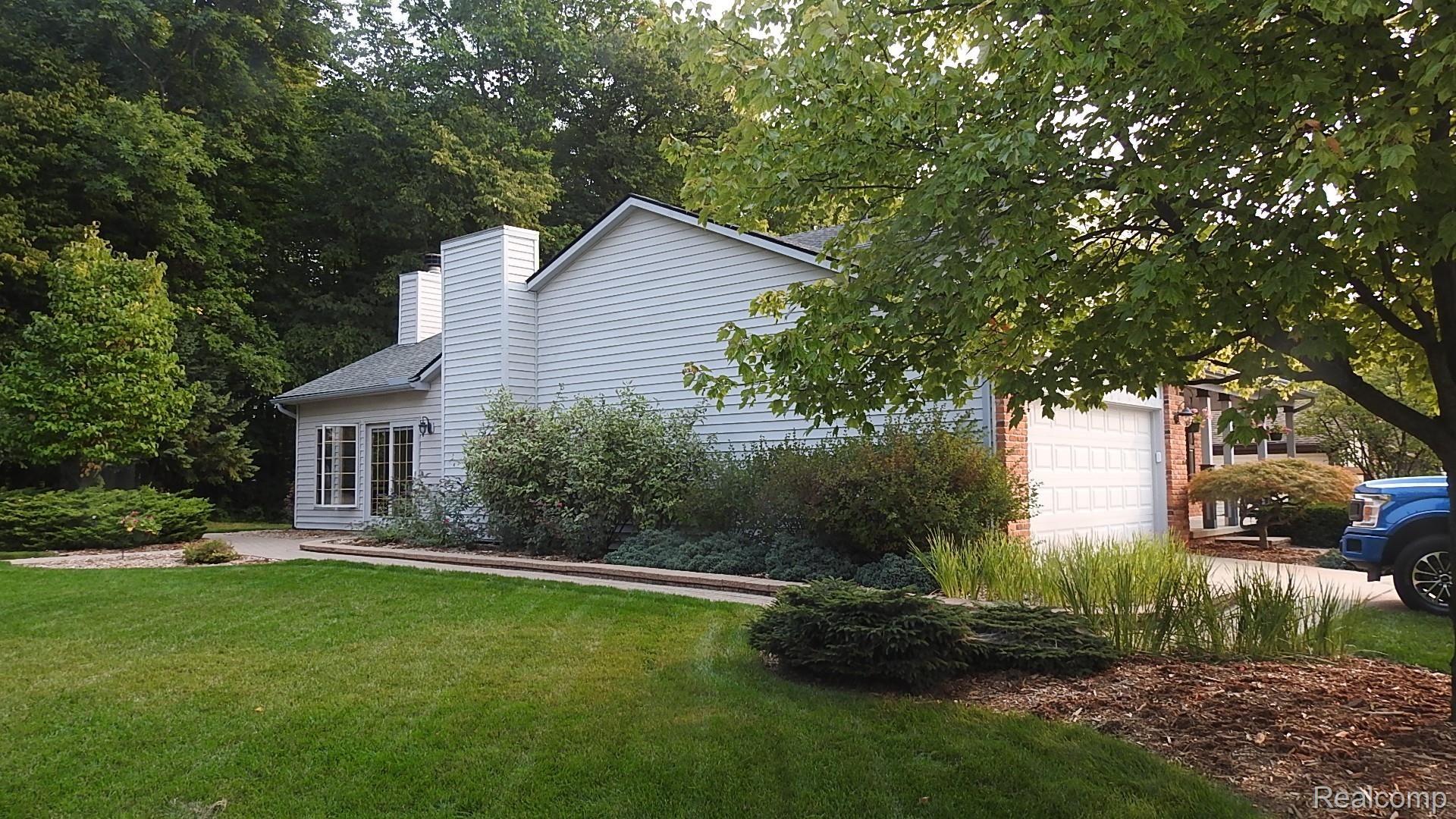 45754 Cider Mill Road Novi, MI 48374 - Photo 5 of 47 West side elevation with addition