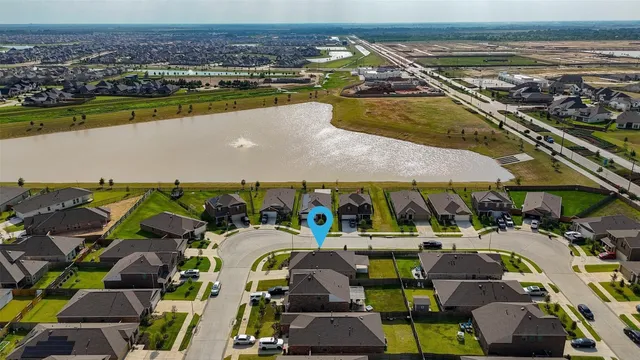 an aerial view of a swimming pool and outdoor space