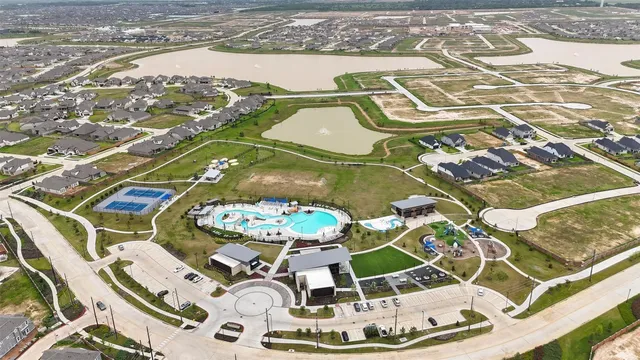 an aerial view of a house with a ocean view