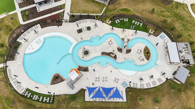 an aerial view of a table and chairs