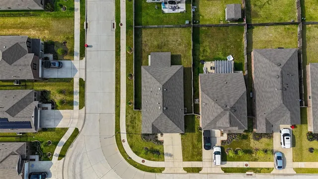 swimming pool view with a garden space