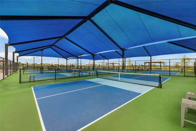 an aerial view of a house with swimming pool