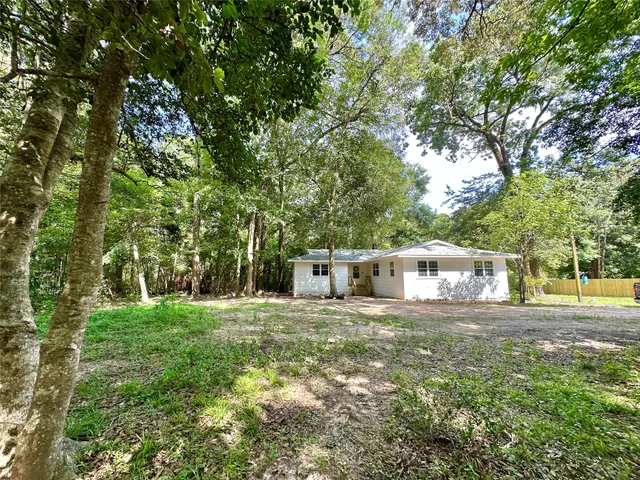 a house view with a outdoor space