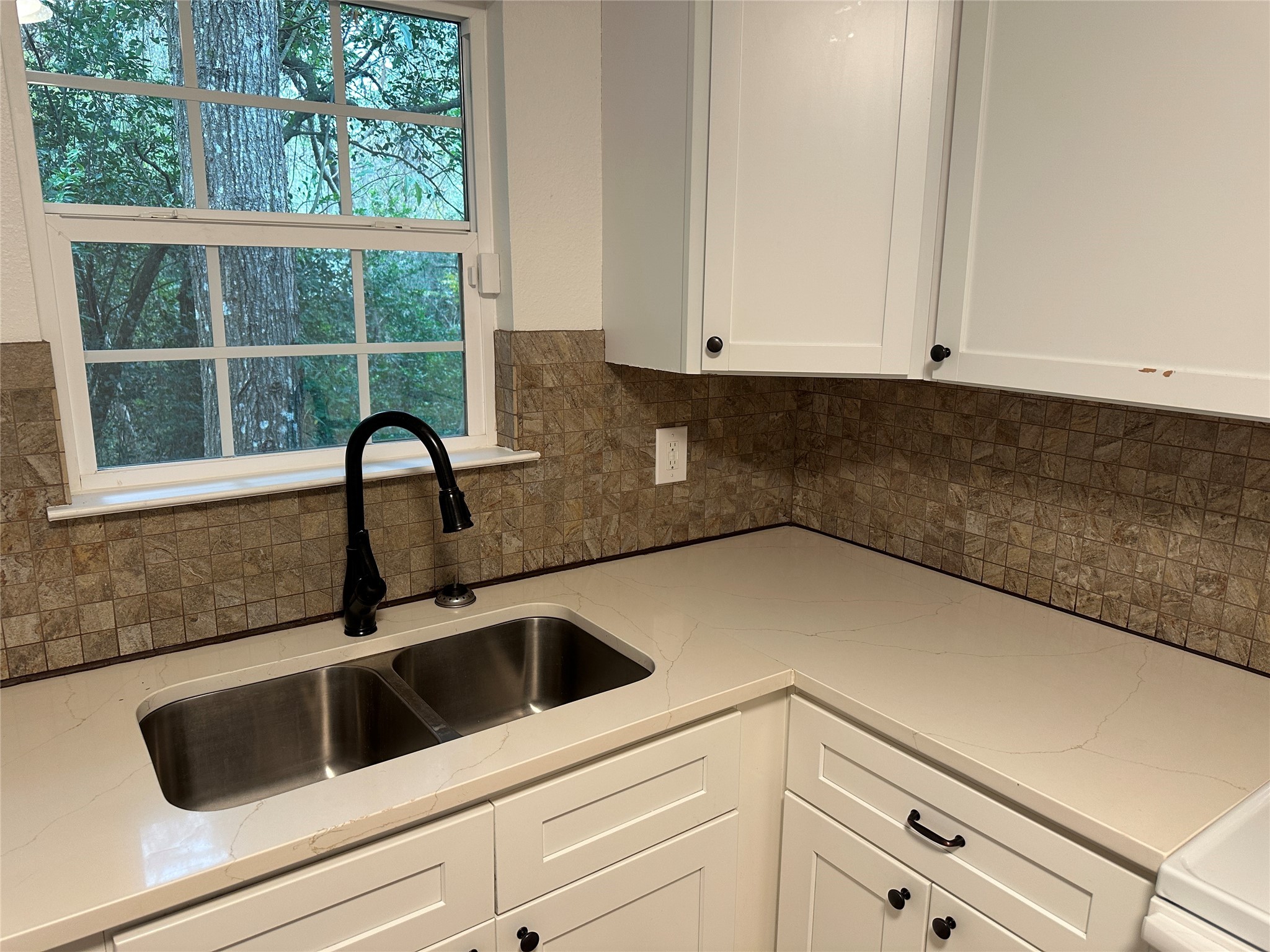 146 Barbara Lane Shepherd, TX 77371 - Photo 8 of 20 a kitchen with a sink and cabinets