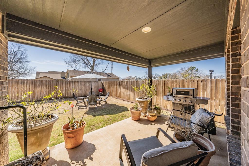141 Maverick Lane Pilot Point, TX 76258 - Photo 11 of 40 a dining room with furniture and a floor to ceiling window