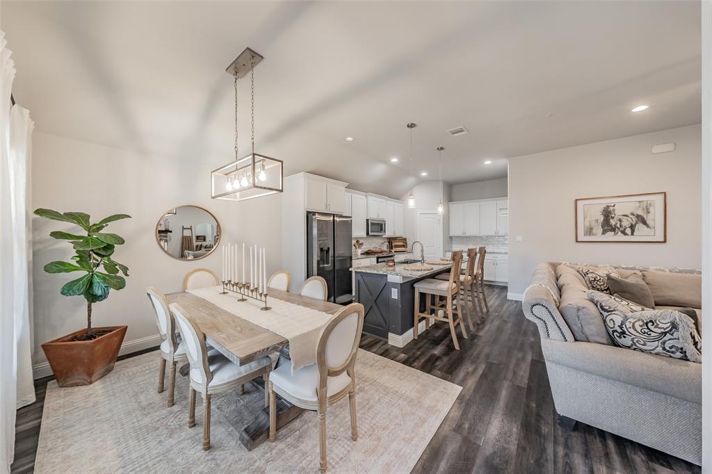 141 Maverick Lane Pilot Point, TX 76258 - Photo 24 of 40 a view of a dining room with furniture