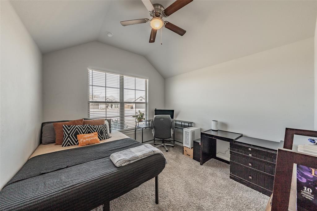 141 Maverick Lane Pilot Point, TX 76258 - Photo 26 of 40 a living room with furniture and a window