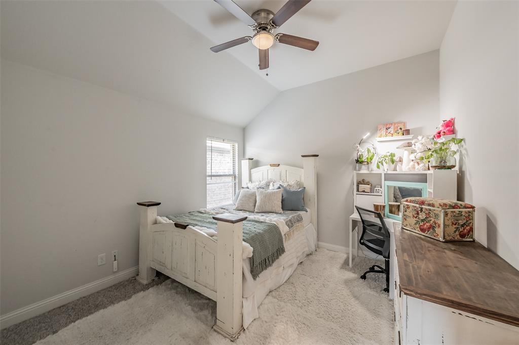 141 Maverick Lane Pilot Point, TX 76258 - Photo 29 of 40 a bed room with a bed and a window