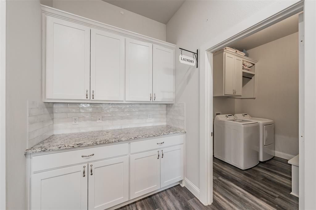 141 Maverick Lane Pilot Point, TX 76258 - Photo 39 of 40 a room with a sink and cabinets