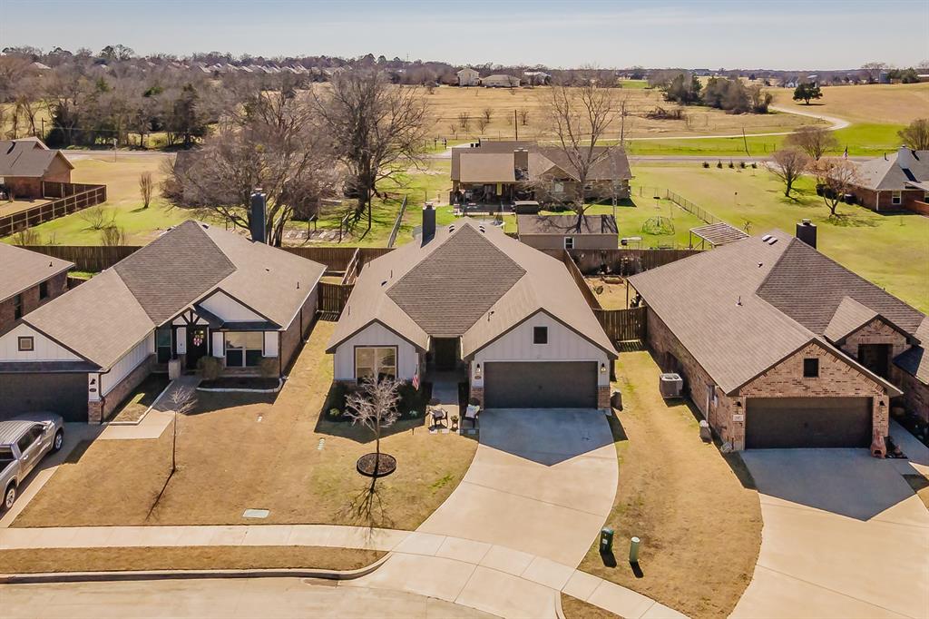 141 Maverick Lane Pilot Point, TX 76258 - Photo 4 of 40 an aerial view of a houses with outdoor space