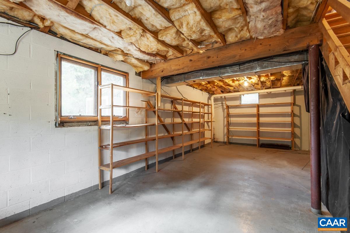 3849 Buck Island Road Charlottesville, VA 22902 - Photo 28 of 50 a view of a room with storage and racks
