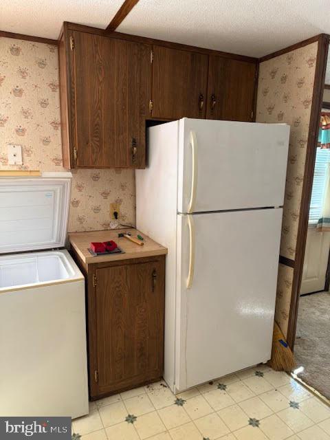 53 Fulton Street Cheswold, DE 19904 - Photo 4 of 17 a white refrigerator freezer sitting in a kitchen