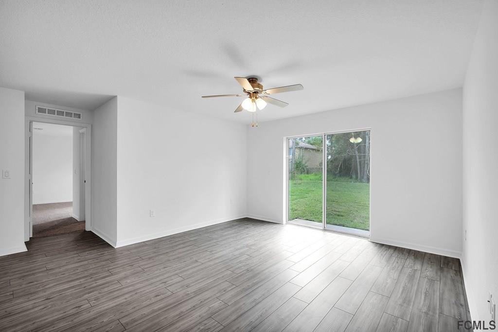 7 Riverside Lane Palm Coast, FL 32164 - Photo 3 of 7 Luxury Vinyl Plank Flooring