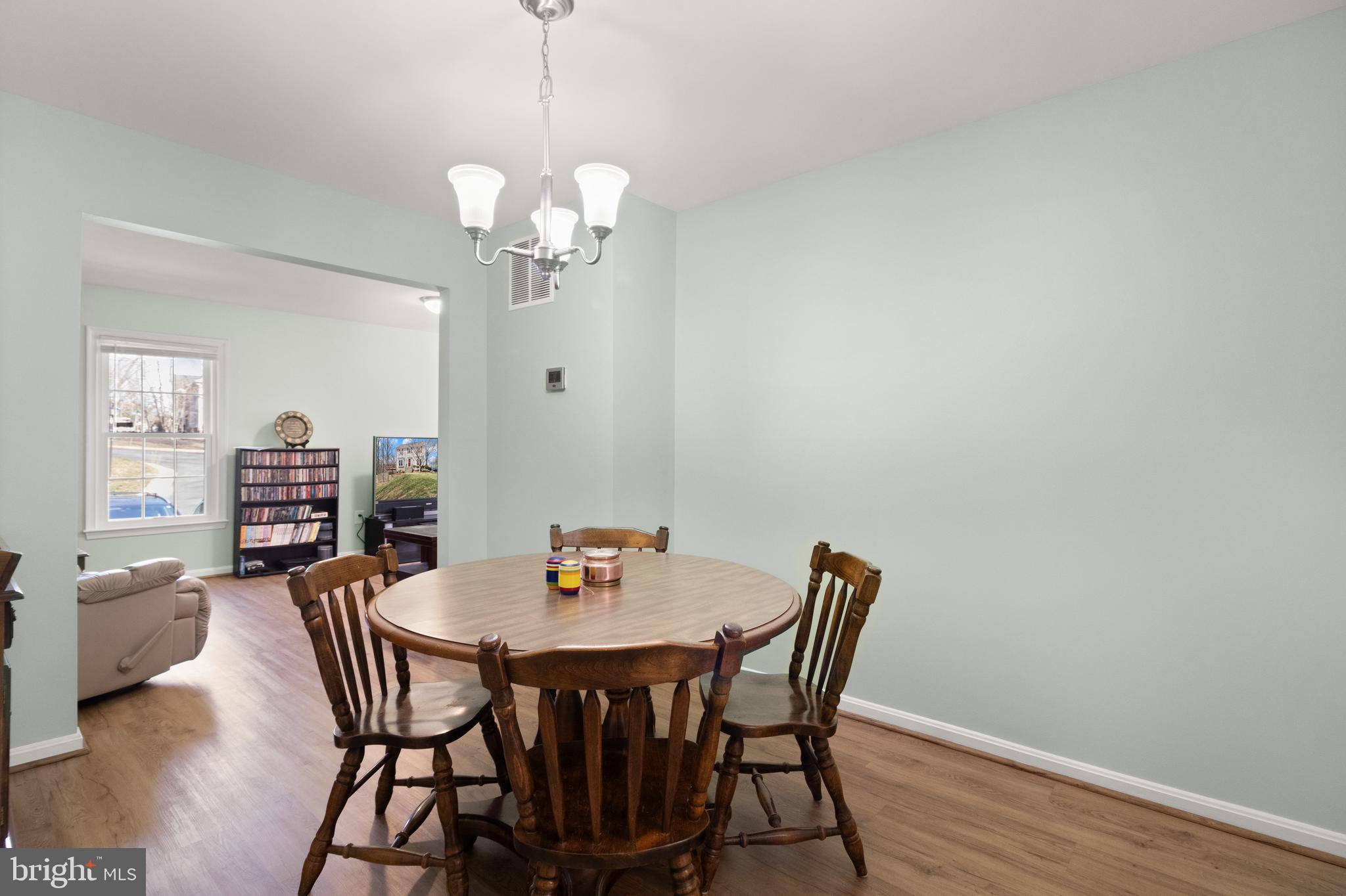 7318 Spring View Court Springfield, VA 22153 - Photo 13 of 41 Dining room opens towards family room