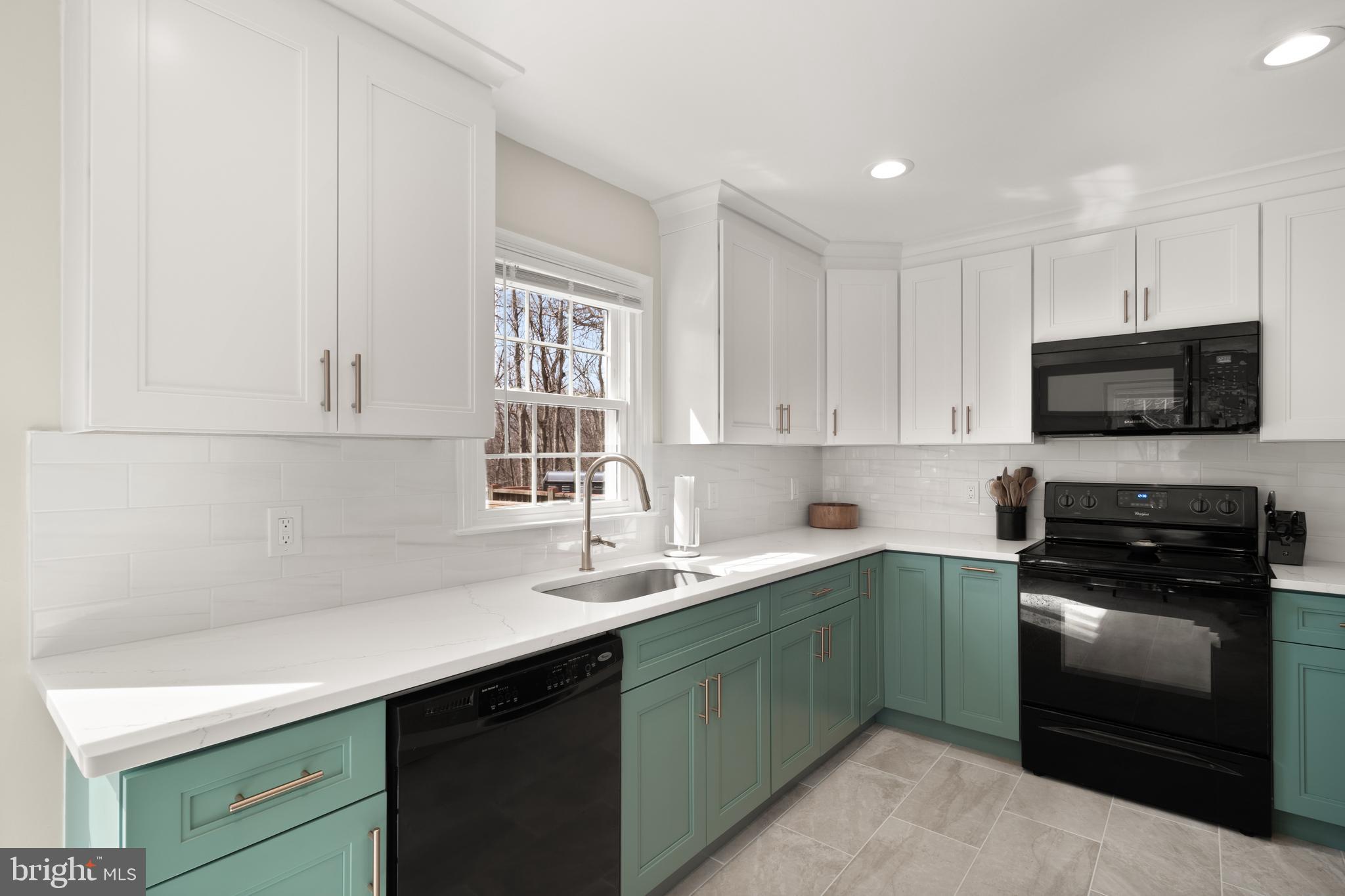 7318 Spring View Court Springfield, VA 22153 - Photo 4 of 41 Ample Cabinet space as well as granite countertops