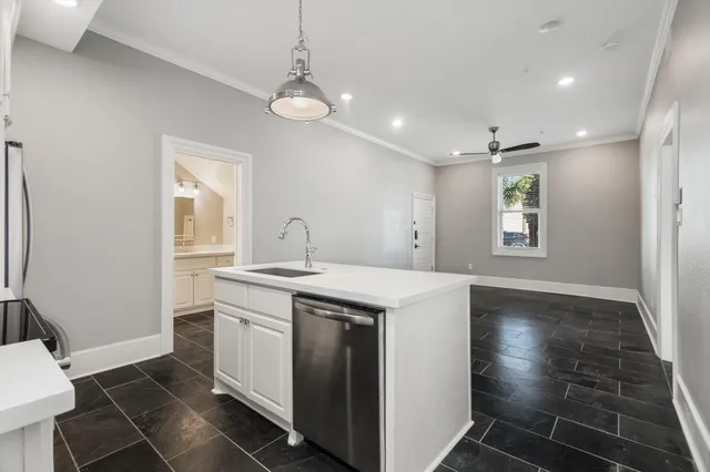 a bathroom with a double vanity sink and mirror