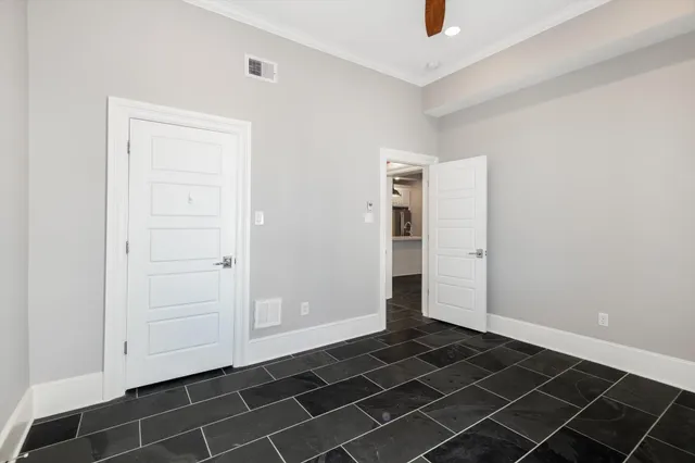 a view of a house with patio and a yard