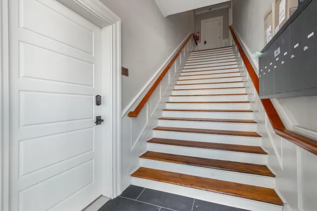 a view of an empty room with a window