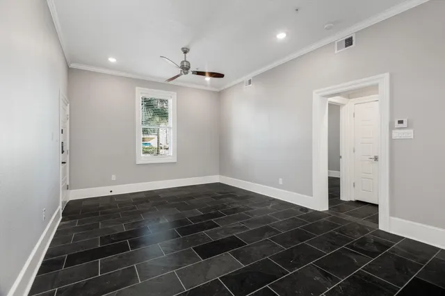 a view of a refrigerator in kitchen and wooden floor