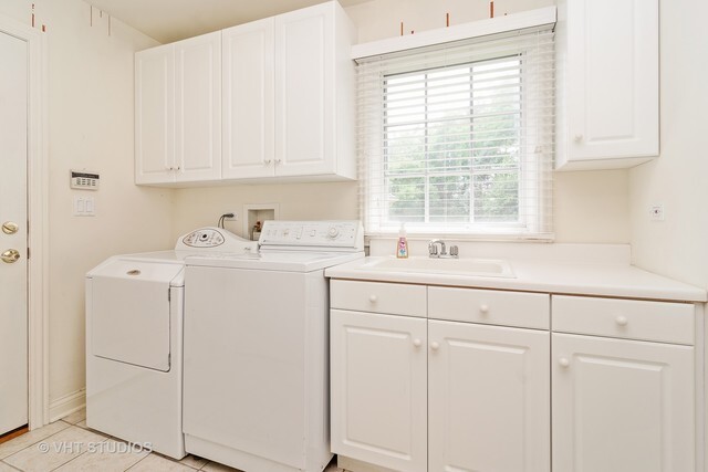 20 Lochbrook Lane Inverness, IL 60010 - Photo 19 of 27 a utility room with cabinets washer and dryer