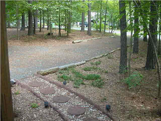 10 Stonewall Road Palmyra, VA 22963 - Photo 5 of 6 a backyard of a house with lots of green space