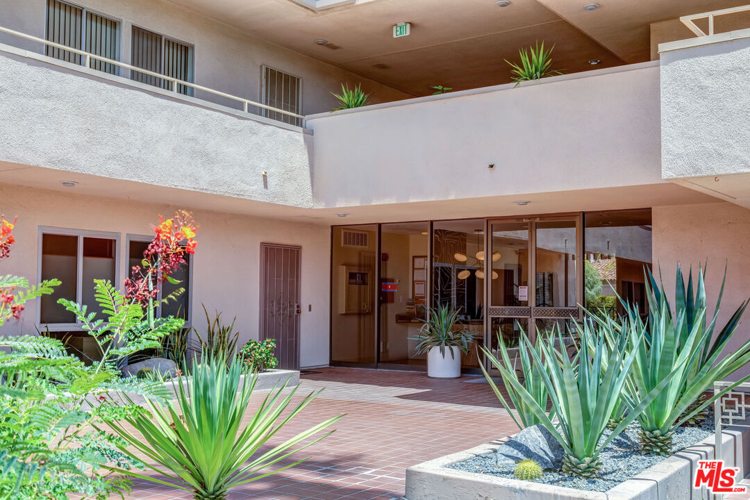 277 East Alejo Road, Unit 119 Palm Springs, CA 92262 - Photo 34 of 46 a view of a entryway front of house